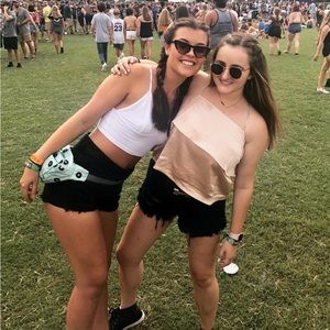 Black denim short with a ruffle detail on the bottom